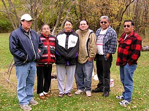 
The Kakaygeesick family is among several prominent Ojibwe families living in the Warroad area. They're pictured on the last remaining six acres of land granted to them in 1905. (MPR photo/Tom Robertson)