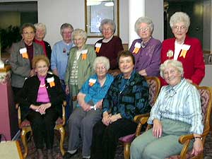 
Members of the record-setting Grand Meadow basketball teams of the 1930s gathered recently to celebrate the publishing of a new book about the history of girls basketball in Minnesota. (MPR Photo/Jayne Solinger)