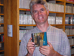 
Artegra Records owner with Dave Graf's new CD,
"Just Like That." (MPR photo/Karl Gehrke)