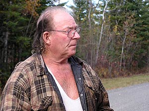 
John Loustari first noticed pigs on his Lake Superior property two years ago.  But he wasn't concerned until this summer when he began spotting large groups of pigs in the wild. (MPR Photo/Bob Kelleher)