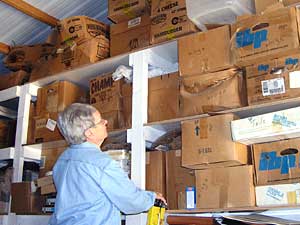 
Donna Landsman stores all of her feathers in her garage.  Boxes are labeled with body parts -- tails, wings, pelts and even heads. (MPR Photo/Cara Hetland)