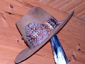 
Donna Landsman's husband and father wanted her to make a popular hatband, because it was too expensive at the time to order one out of a catalog. That was her first attempt at feather art, some 50 years ago.  (MPR Photo/Cara Hetland)