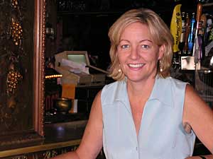 
Sue Jeffers owns Stub and Herbs, a Minneapolis bar, and is a vocal opponent of the smoking ban. She says bars and related businesses are suffering financially because of it.  (MPR file photo)
