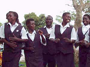 
The members of The AIDS Support Organization (TASO) Mbale are all living with HIV, but during a performance by the TASO Mbale Drama Group, they're all smiles. (Photo: Jonah Eller-Isaacs)