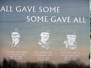 
Members of Charlie Company also gathered for the dedication of a memorial to three of their comrades who were killed by a roadside bomb in Iraq in February.  (MPR photo/Mark Steil)
