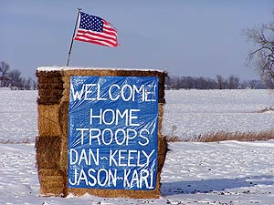 
As Charlie Company returned, the troops saw tributes along the roadside. This homemade tribute to the soldiers stood along Highway 59 south of Morris.
  (MPR photo/Mark Steil)