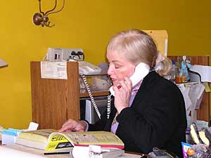
Artist Carol Wright is in charge of transforming the current artist studio into a gallery.  She says the member artists will all have a turn at having a prominant place in the gallery. (MPR Photo/Cara Hetland)
