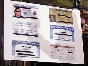 
Pawlenty showed examples of false identification that are sometimes used by illegal immigrants. (MPR Photo/Tom Scheck)