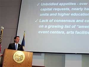
Pawlenty used some visuals to emphasize his point that many state agencies ask for vastly inflated capital projects, then express disappointment when they don't receive their full request.  He cited MnSCU as one example.  (MPR Photo/Tom Scheck)