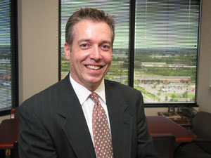 
"We think it's the future; we're making a lot of investments to stay at the front end of, really, a very entrepreneurial business environment right now,"  says Dave Spalding, business development vice president  of Blue Cross Blue Shield of Minnesota, which is starting a bank.
 (MPR Photo/Mark Steil)
