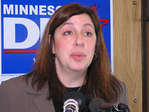 
DFL Associate Party Chair Donna Cassutt says the budget bill awaiting the president's signature cuts funding for student aid, Medicare, Medicaid and child support enforcement. (MPR Photo/Laura McCallum)